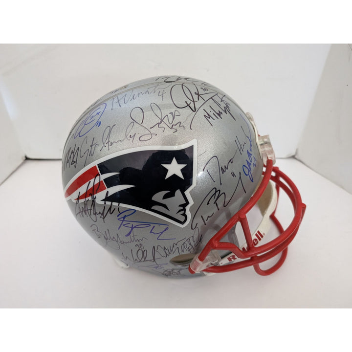 New England Patriots Tom Brady Adam Troy Brown Mike Vrabel Teddy Bruschi Bill Belichick Super Bowl champions 2001 Riddell team signed helmet