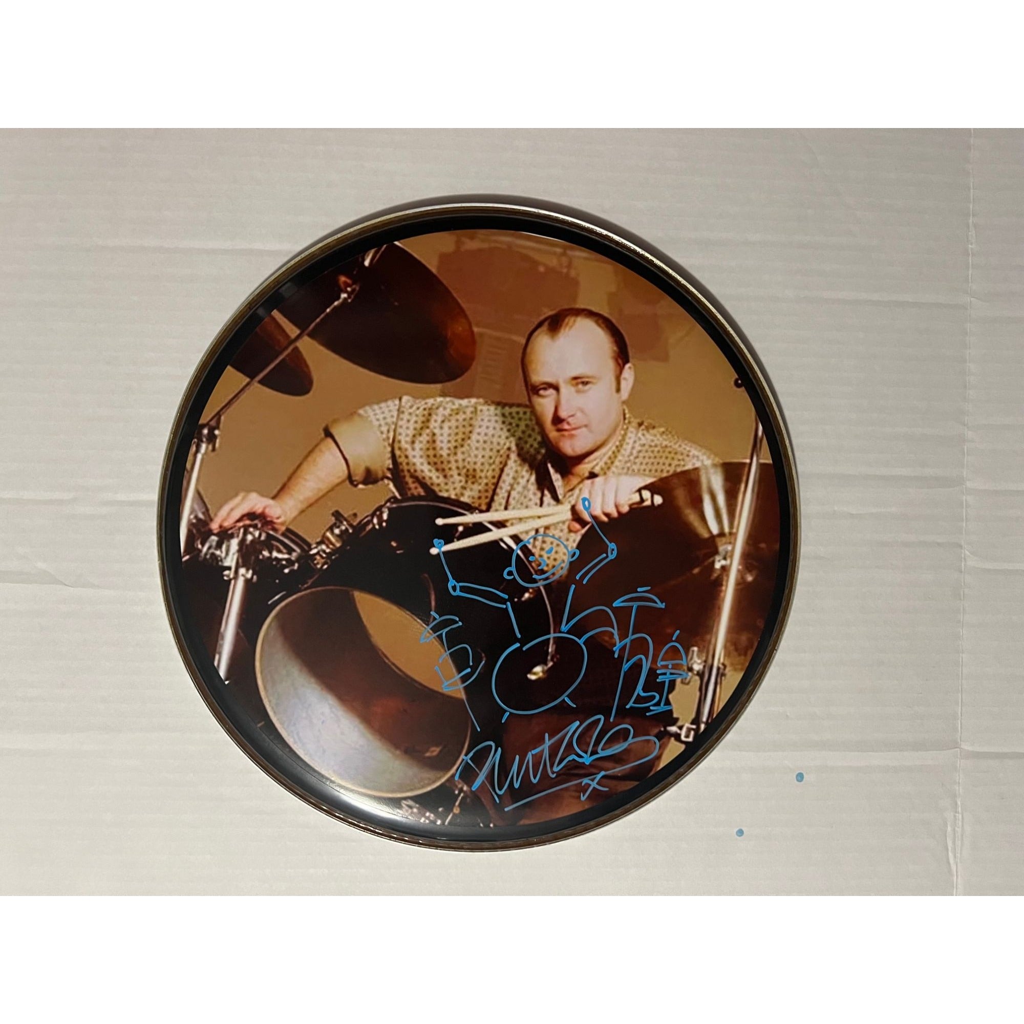 Phil Collins iconic Genesis drummer 14 inch one of a kind drumhead signed with sketch