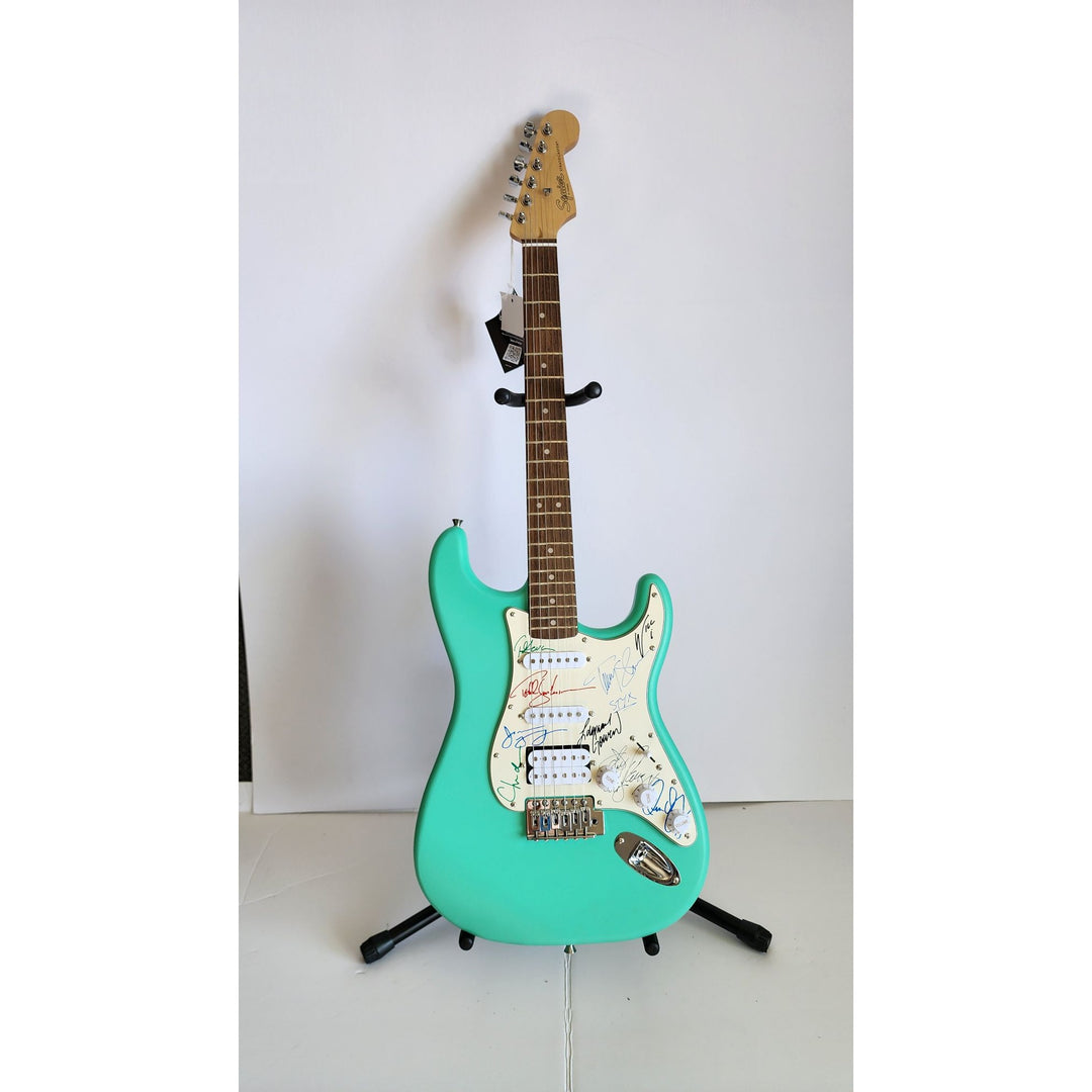 James Young, Tommy Shaw, Todd Sucherman, Lawrence Gowan, Will Evankovich, Terry Gowan Dennis DeYoung Fender Stratocaster signed with proof