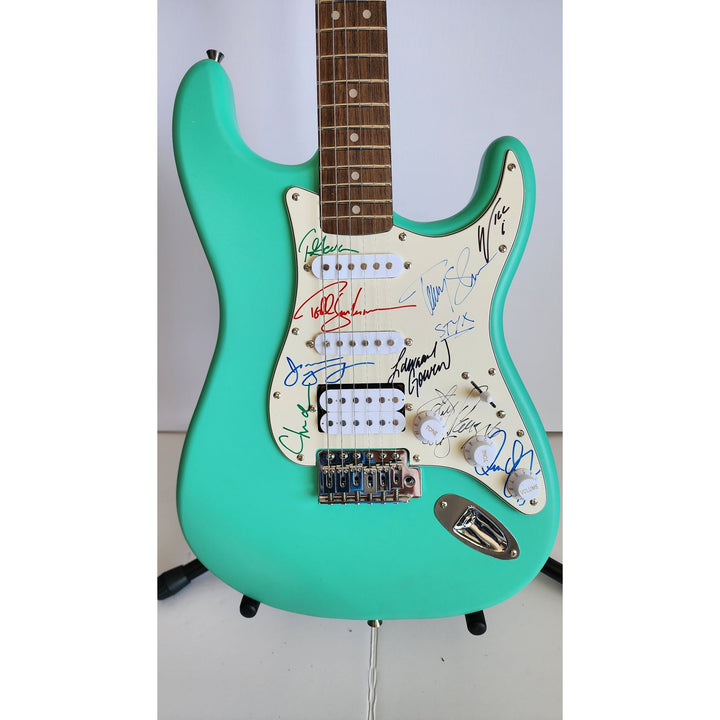 James Young, Tommy Shaw, Todd Sucherman, Lawrence Gowan, Will Evankovich, Terry Gowan Dennis DeYoung Fender Stratocaster signed with proof