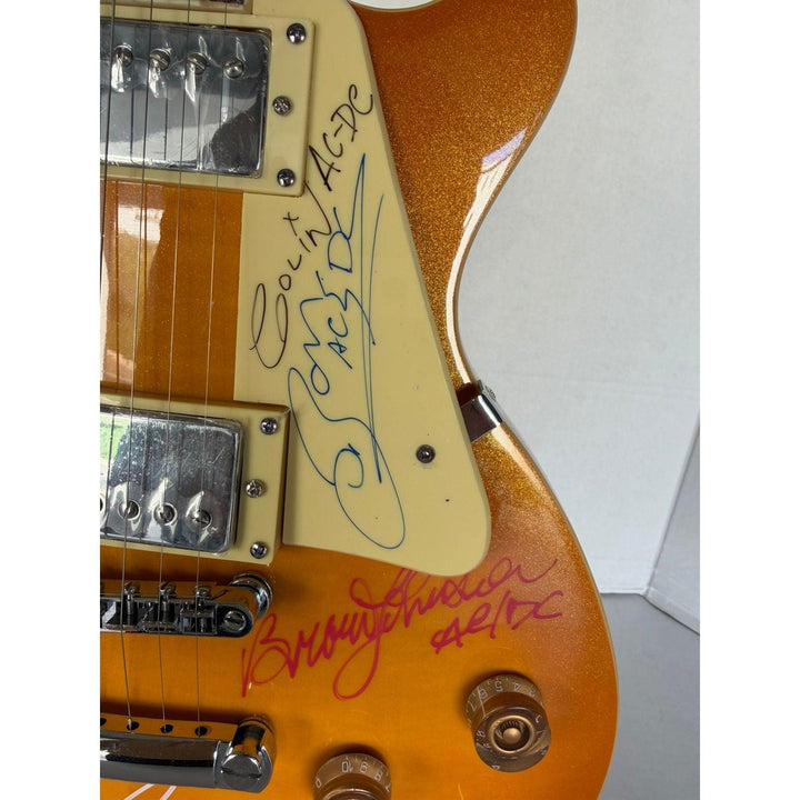 ACDC vintage gold les paul electric guitar with Dave Evans, Colin Burgess, Bon Scott, Angus & Malcom Young, Cliff Williams & Phil Rudd.