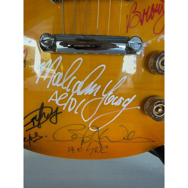 ACDC vintage gold les paul electric guitar with Dave Evans, Colin Burgess, Bon Scott, Angus & Malcom Young, Cliff Williams & Phil Rudd.