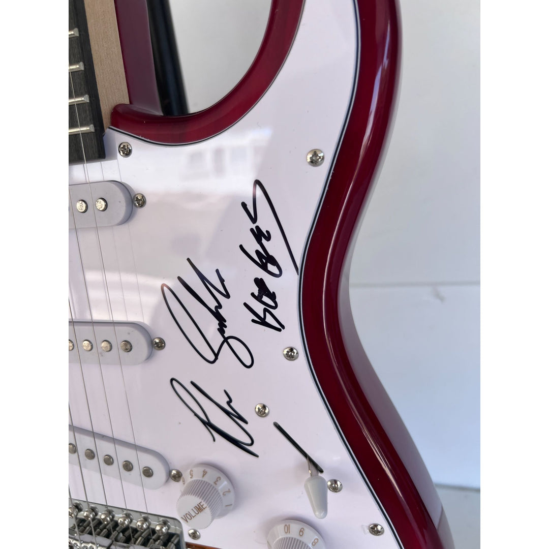 Barry, Robin and Maurice Gibb the Bee Gees electric guitar signed with proof.