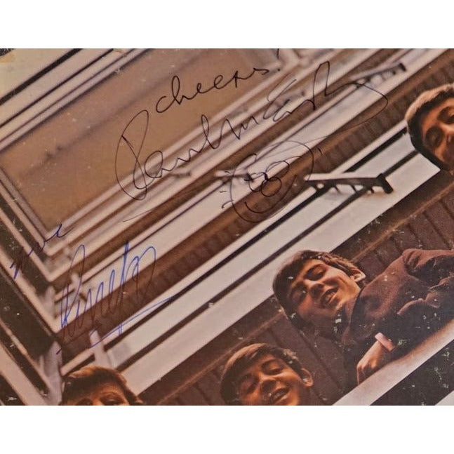 The Beatles "The Beatles/1962-1966" LP signed with proof.