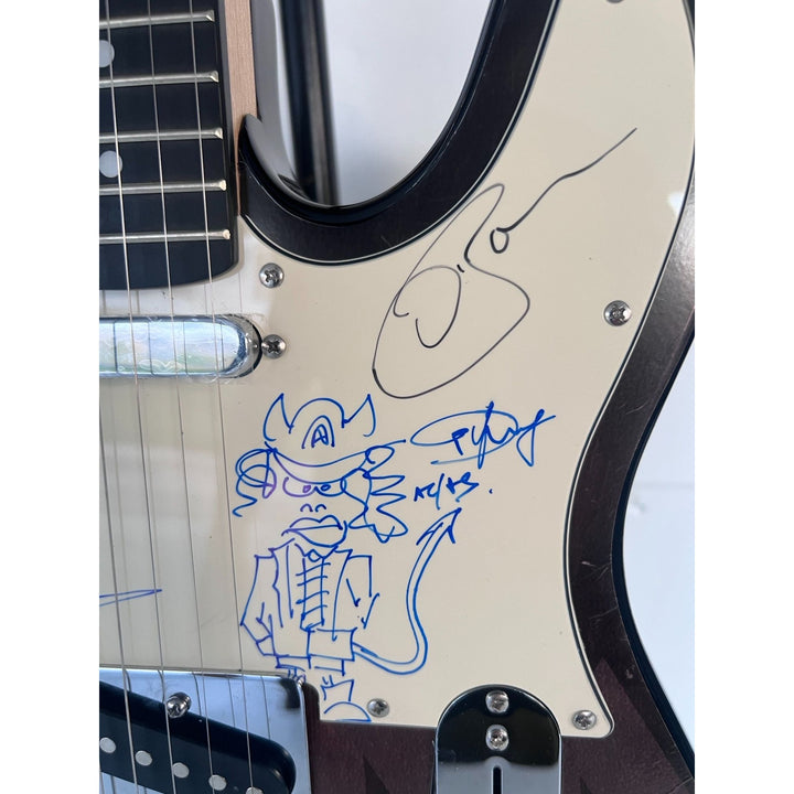 AC/DC Bon Scott, Cliff Williams, Angus Young, Malcolm Young, Phil Rudd one of a kind telecaster full size electric guitar signed with proof.