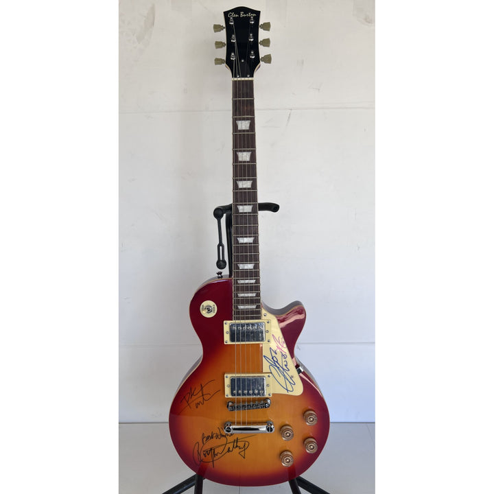 The Who Roger Daltry, Pete Townshend, John Entwhistle full size vintage cherry les paul guitar signed with proof.