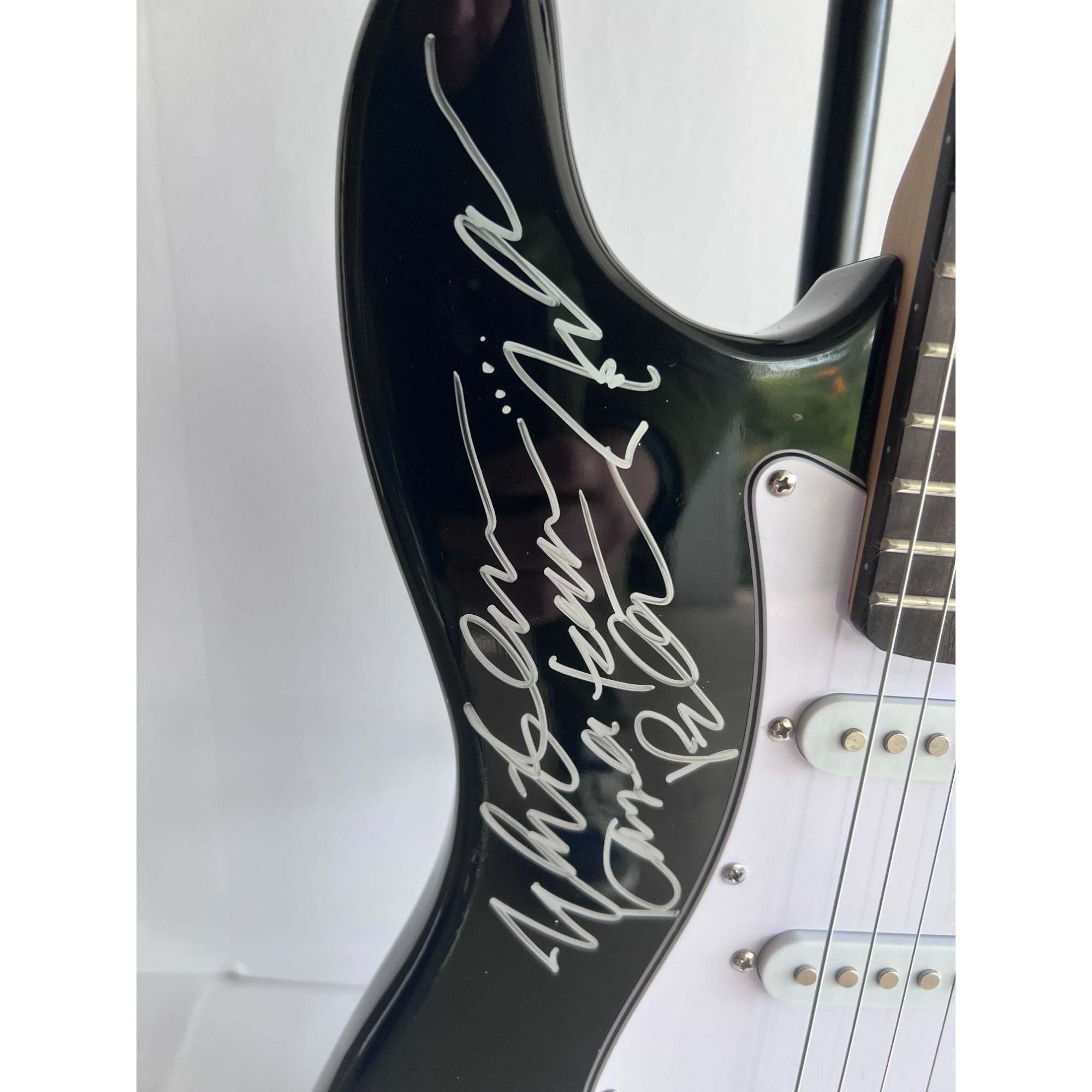 The Monkees Michael Nesmith, Peter Tork, Micky Dolenz, and Davey Jones full size Stratocaster electric guitar signed with proof