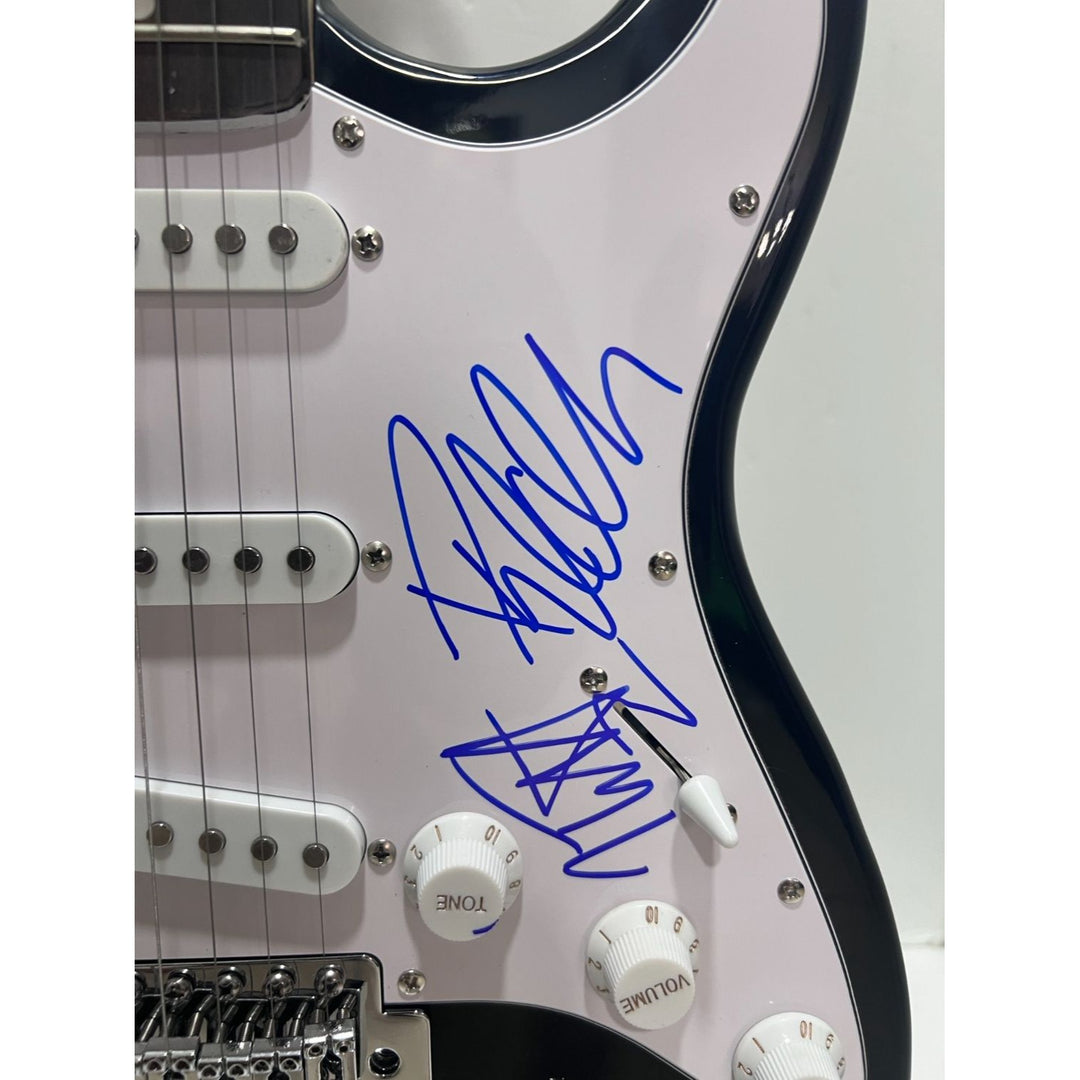 Def Leppard  Phil Collen, Vivian Campbell, Joe Elliott, Rick Savage, Rick Allen. stratocaster electric guitar signed with proof