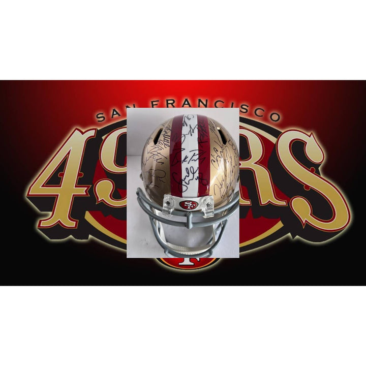 San Francisco 49ers 2023 24 Deebo Samuel, Brock Purdy Christian McCaffrey full size replica helmet team signed whit proof