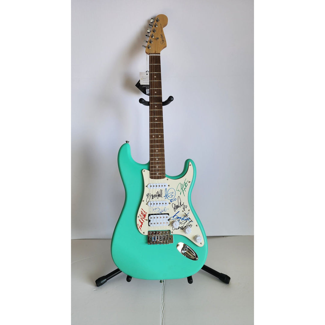 REO Speedwagon Bruce Hall, Dave Matto, Gary Richrath, Kevin Cronin, Neal Dought Fender Stratocaster Squier electric guitar signed with proof