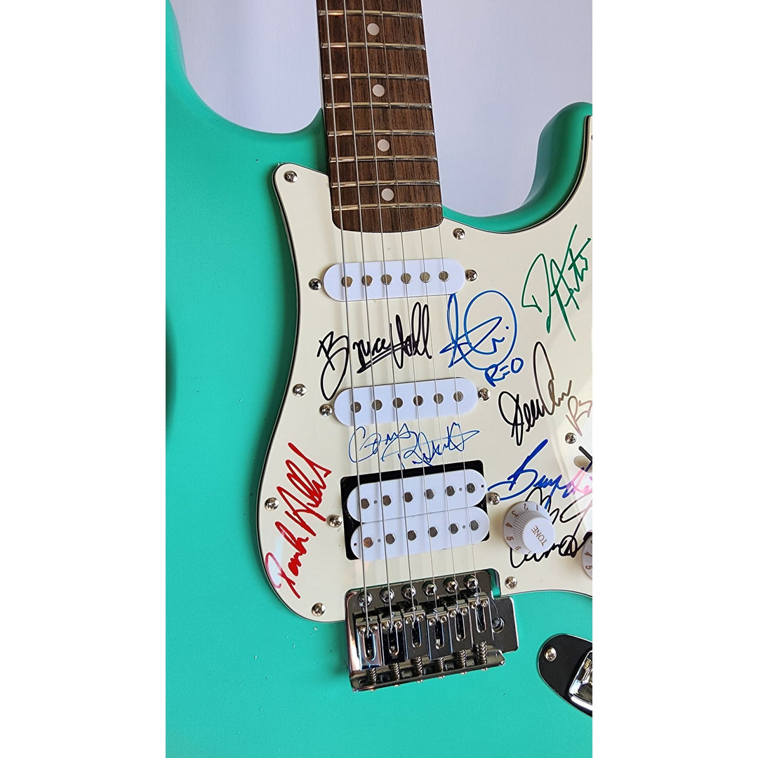 REO Speedwagon Bruce Hall, Dave Matto, Gary Richrath, Kevin Cronin, Neal Dought Fender Stratocaster Squier electric guitar signed with proof