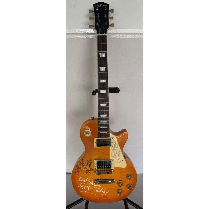 The Who Pete Townshend, Roger Daltrey, John Entwistle, Keith Moon gold les paul electric guitar signed with proof.