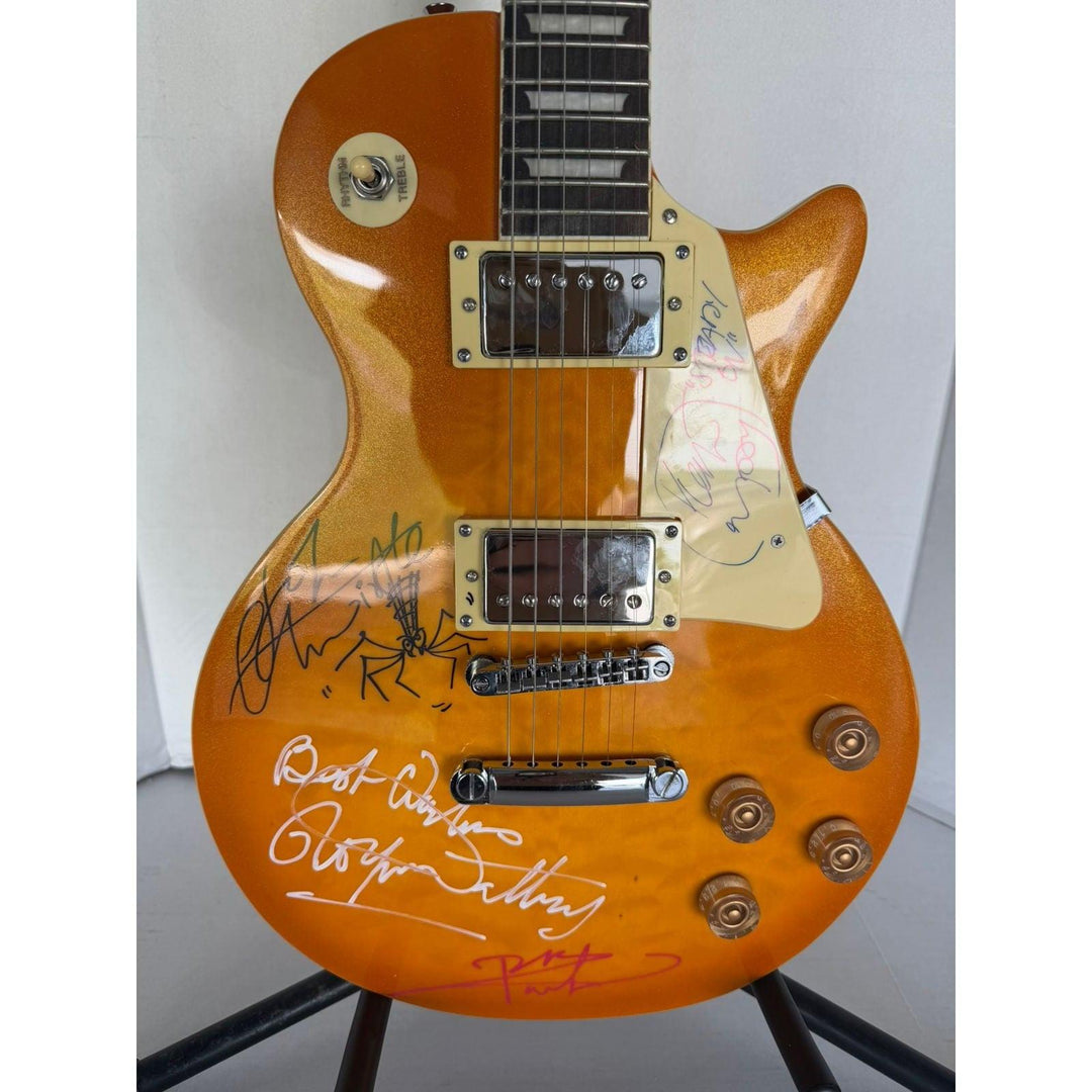 The Who Pete Townshend, Roger Daltrey, John Entwistle, Keith Moon gold les paul electric guitar signed with proof.