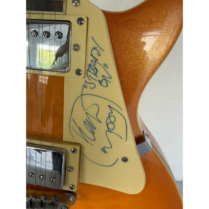 The Who Pete Townshend, Roger Daltrey, John Entwistle, Keith Moon gold les paul electric guitar signed with proof.