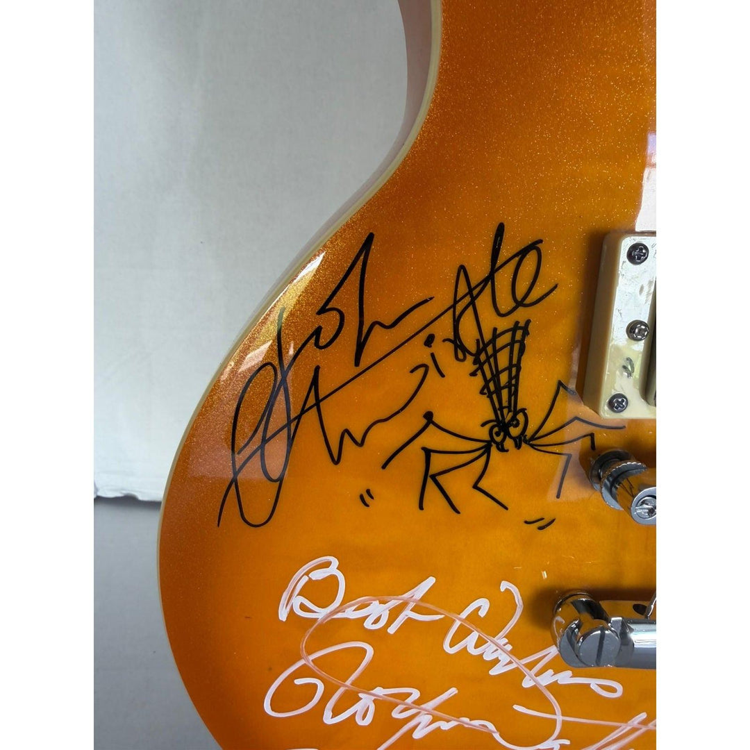 The Who Pete Townshend, Roger Daltrey, John Entwistle, Keith Moon gold les paul electric guitar signed with proof.