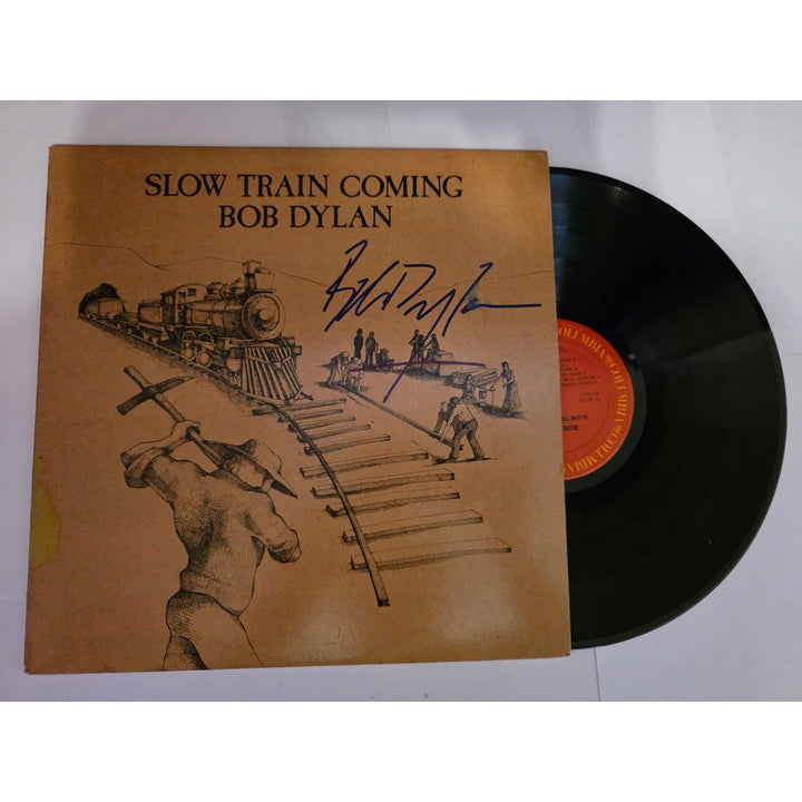 Bob Dylan "Slow Train Coming" LP signed with proof.