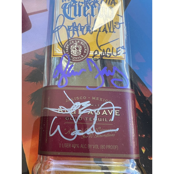 Don Henley, Glenn Frey, Don Felder, Joe Walsh, Randy Meisner 'Just Another Tequila Sunrise' Eagles tequila bottle signed & framed "22x30"