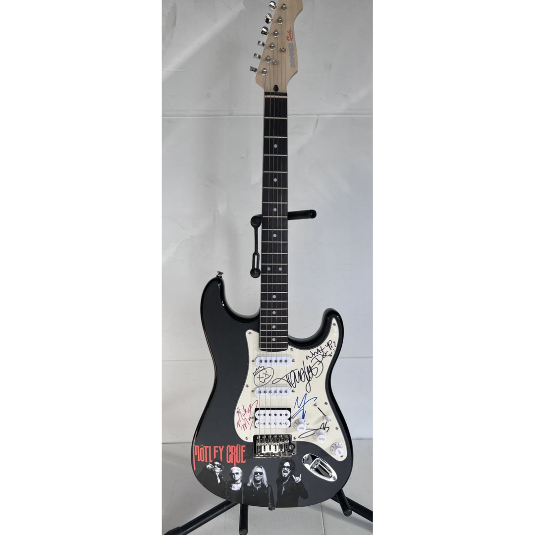 Motley Crue Tommy Lee, Vince Neil, Mick Mars, Nikki Sixx Stratocaster one of a kind full size electric guitar signed with proof.
