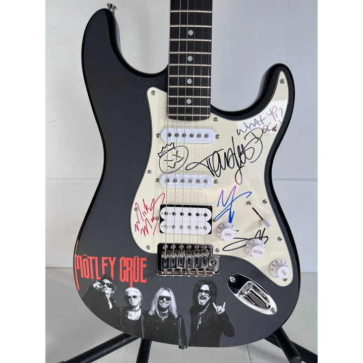 Motley Crue Tommy Lee, Vince Neil, Mick Mars, Nikki Sixx Stratocaster one of a kind full size electric guitar signed with proof.