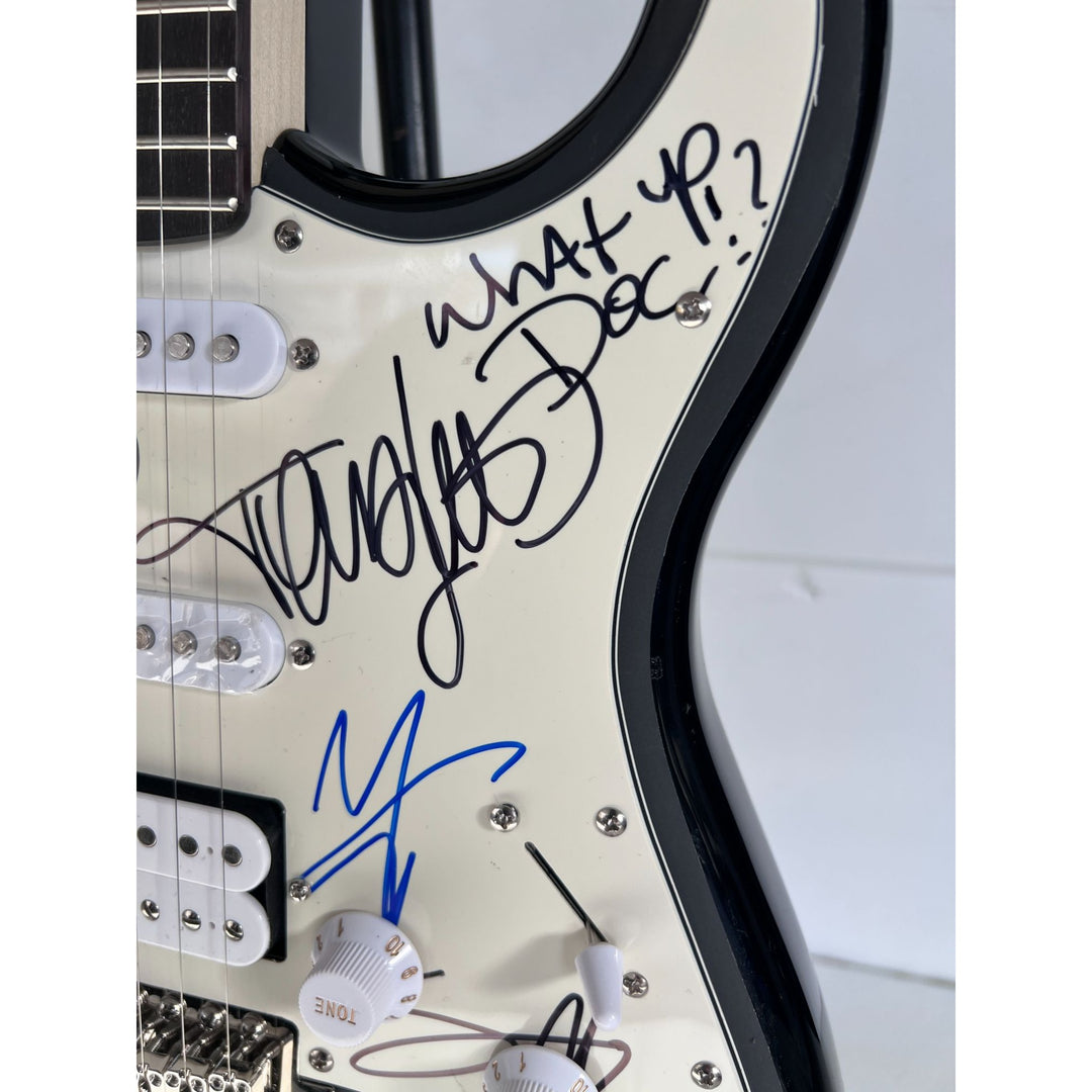 Motley Crue Tommy Lee, Vince Neil, Mick Mars, Nikki Sixx Stratocaster one of a kind full size electric guitar signed with proof.