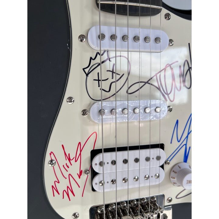 Motley Crue Tommy Lee, Vince Neil, Mick Mars, Nikki Sixx Stratocaster one of a kind full size electric guitar signed with proof.