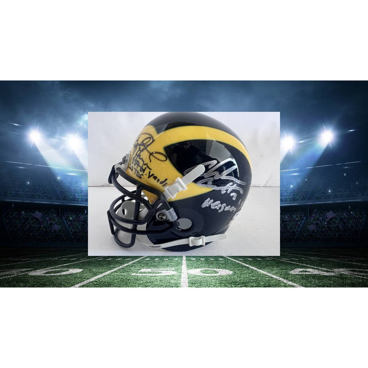 University of Michigan Heisman Trophy award winners Charles Woodson and Desmond Howard Riddell mini helmet signed with proof