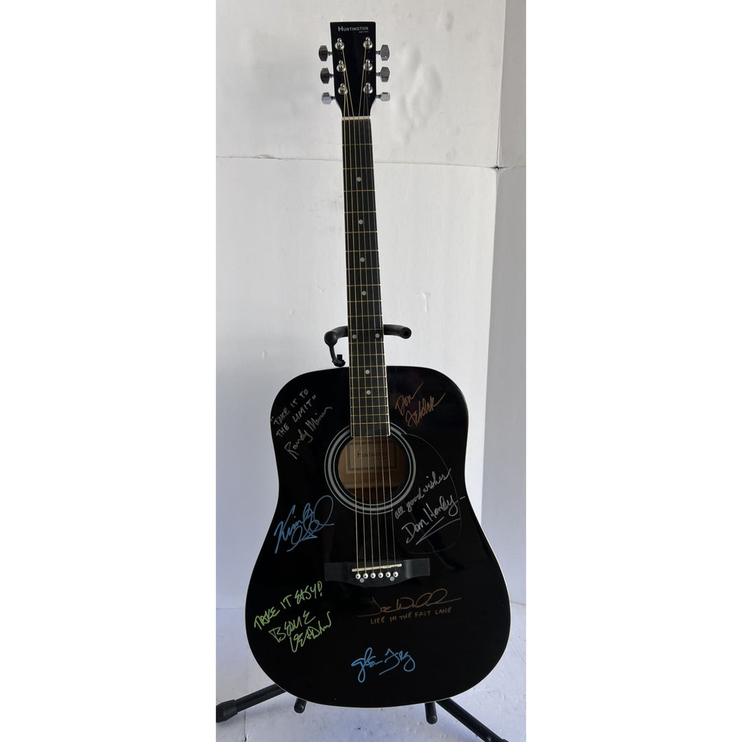 The Eagles Bernie Laden Joe Walsh Don Henley Glenn Frey Randy Meisner signed and inscribed full size acoustic guitar with proof