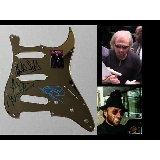 Barry Gibb, Robin Gibb the Bee Gees  Stratocaster electric pickguard signed with proof