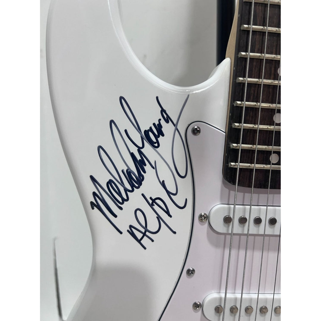 Angus Young & Malcolm Young Brian Johnston Clff Williams Phil Rudd white electric stratocaster signed with proof