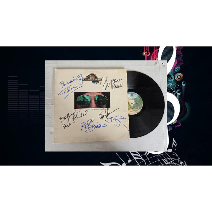 The Doobie Brothers ''Living on the Fault Line'' LP signed with proof.