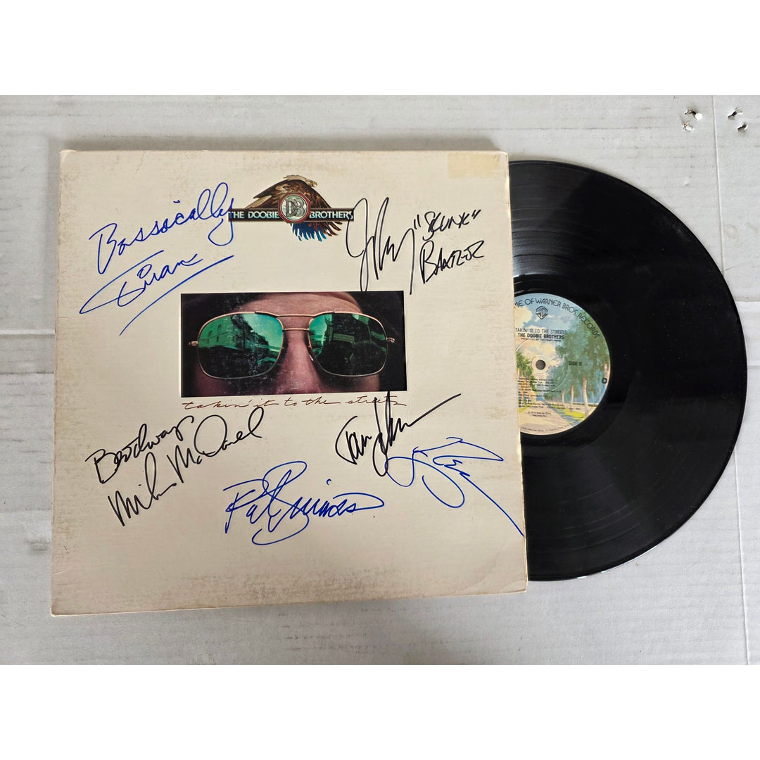 The Doobie Brothers ''Living on the Fault Line'' LP signed with proof.