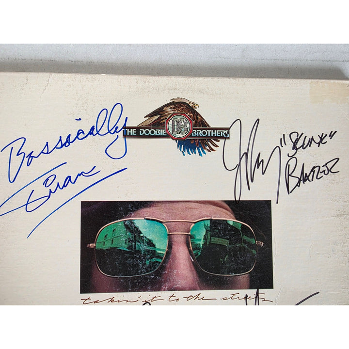 The Doobie Brothers ''Living on the Fault Line'' LP signed with proof.
