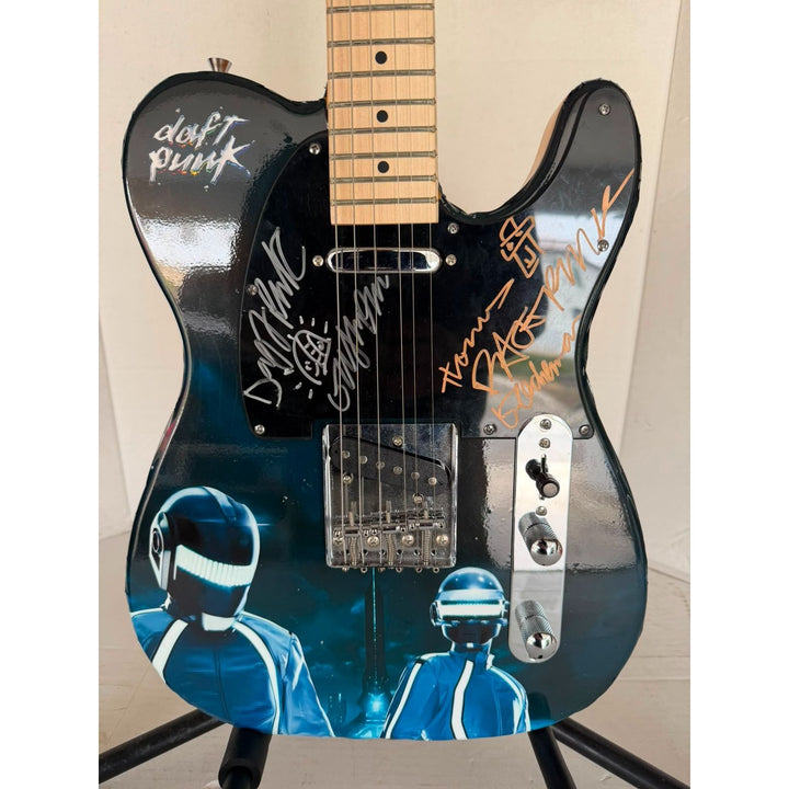 Daft Punk (Thomas Bangalter & Guy Manuel de Homem-Christo) signed with sketch on "One of a Kind" telecaster full size electric guitar $3499.