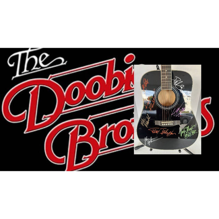The Doobie Brothers Tom Johnston Patrick Simmons Michael McDonald Jeff "Skunk" Baxter and Keith Knudsen full size acoustic guitar signed