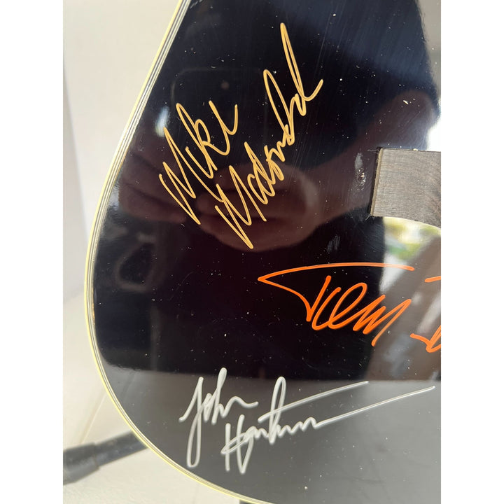 The Doobie Brothers Tom Johnston Patrick Simmons Michael McDonald Jeff "Skunk" Baxter and Keith Knudsen full size acoustic guitar signed