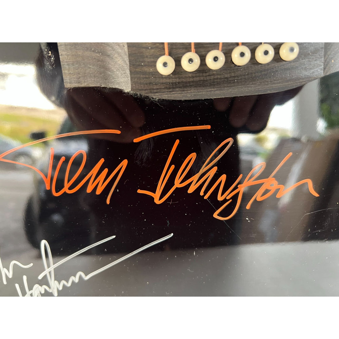 The Doobie Brothers Tom Johnston Patrick Simmons Michael McDonald Jeff "Skunk" Baxter and Keith Knudsen full size acoustic guitar signed