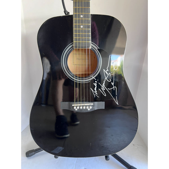 Waylon Jennings black acoustic guitar signed with proof