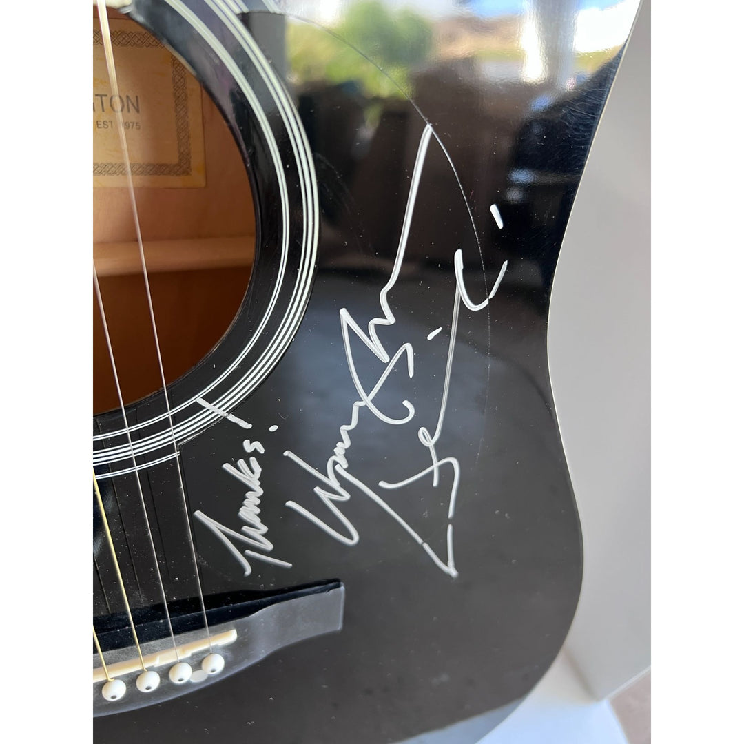 Waylon Jennings black acoustic guitar signed with proof