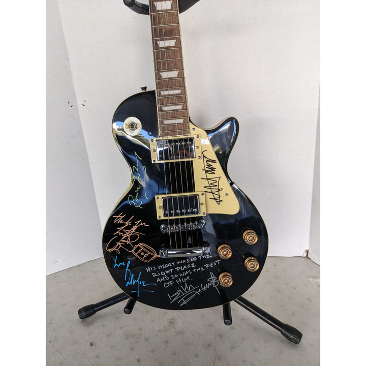 Rolling Stones les paul electric guitar signed by Mick, Keith, Charlie,Ronnie and Bill with lyrics and sketches incredible!