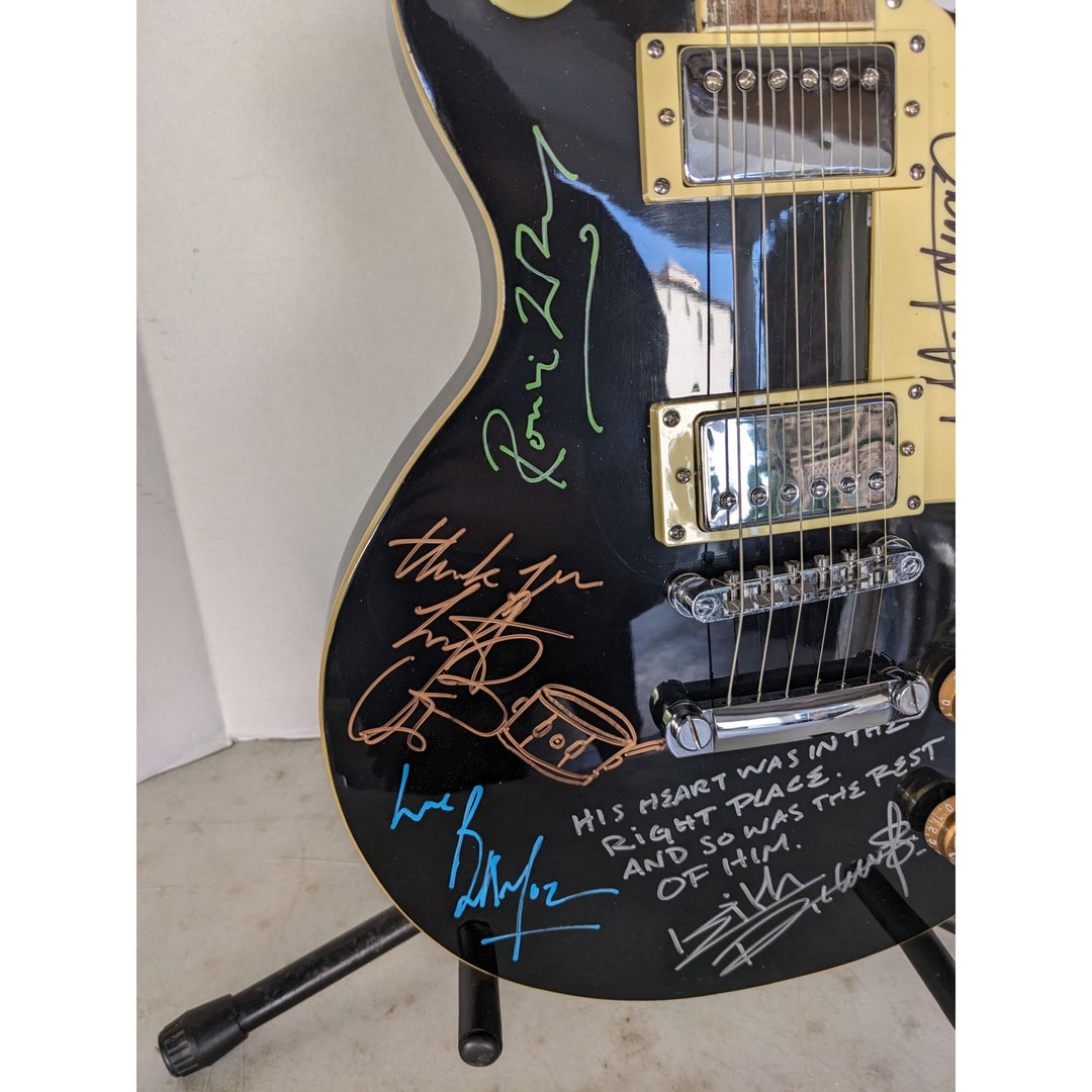Rolling Stones les paul electric guitar signed by Mick, Keith, Charlie,Ronnie and Bill with lyrics and sketches incredible!