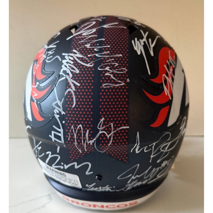Denver Broncos speed authentic 2025 team signed helmet 40 plus Bo Nix Courtland Sutton, Nik Bonnito, Sean Payton with proof.