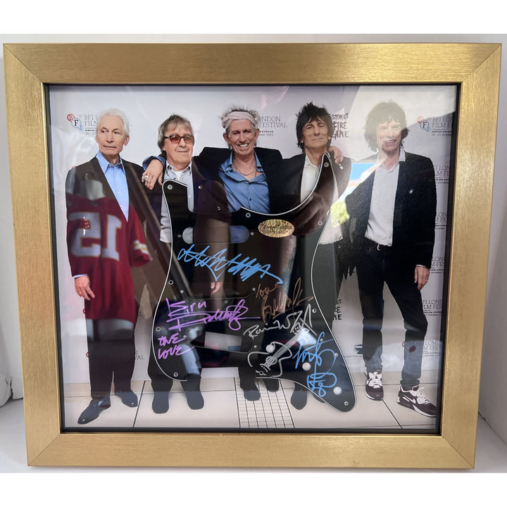 Mick Jagger Keith Richards Bill Wyman Charlie Watts Ronnie Wood Fender Stratocaster electric guitar pickguard signed and framed (17x19)