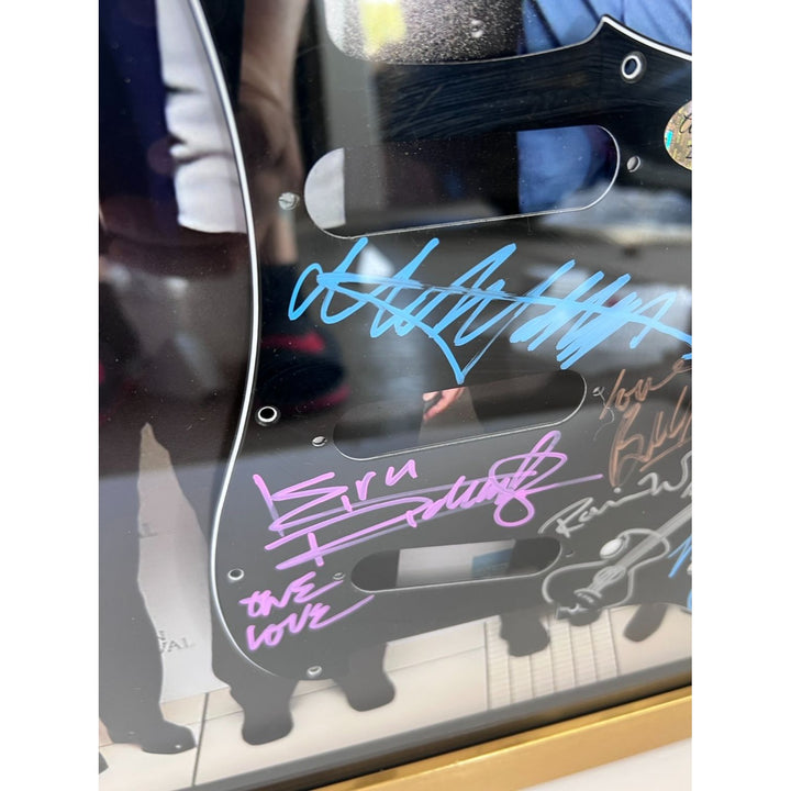 Mick Jagger Keith Richards Bill Wyman Charlie Watts Ronnie Wood Fender Stratocaster electric guitar pickguard signed and framed (17x19)