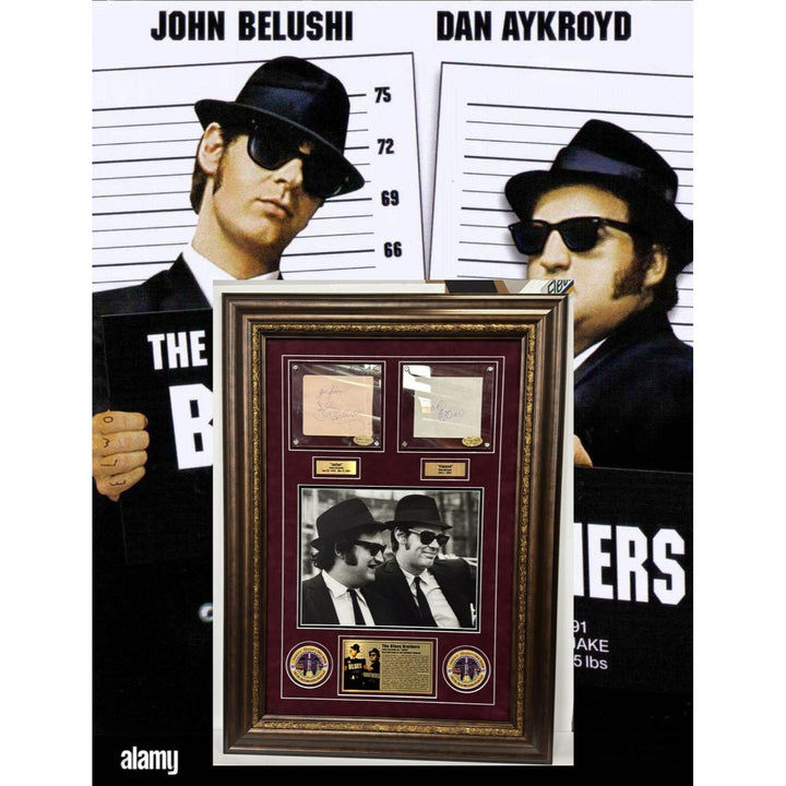 The Blues Brothers John Belushi & Dan Akroyd autograph book page signed with proof & museum quality frame with plexi 25x35.