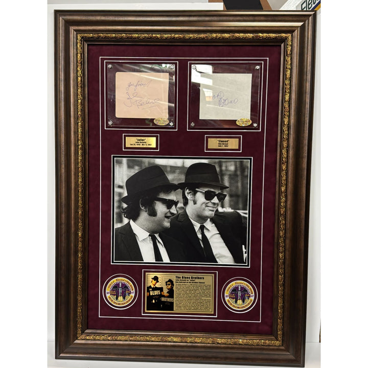The Blues Brothers John Belushi & Dan Akroyd autograph book page signed with proof & museum quality frame with plexi 25x35.