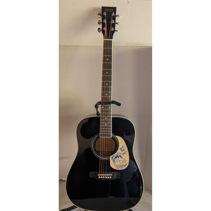 Jimmy Buffett 41' full size acoustic guitar signed with proof