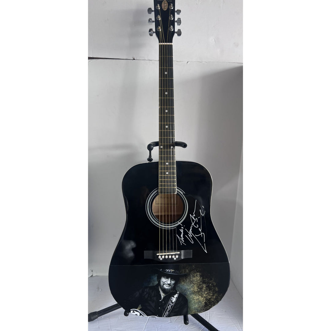 Waylon Jennings black acoustic guitar signed with proof