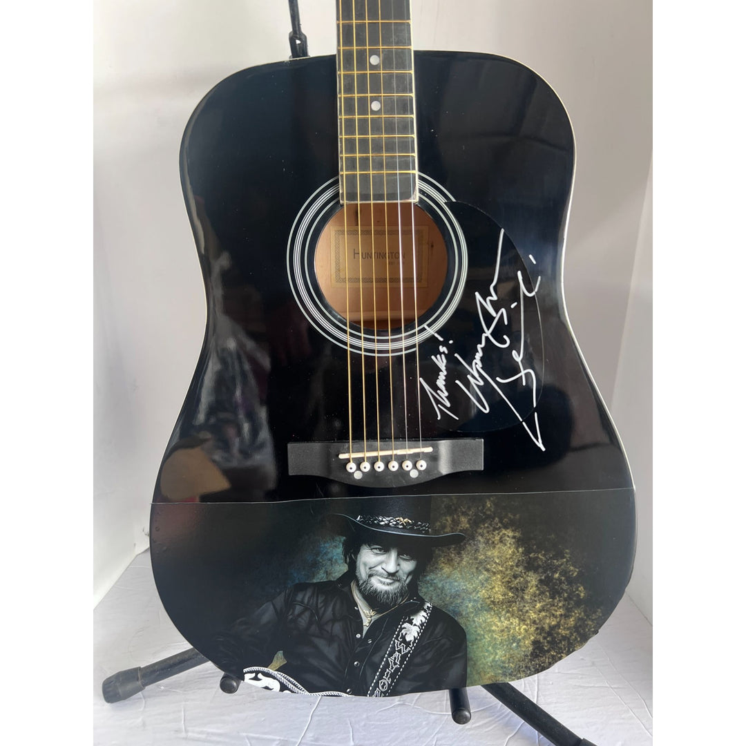 Waylon Jennings black acoustic guitar signed with proof