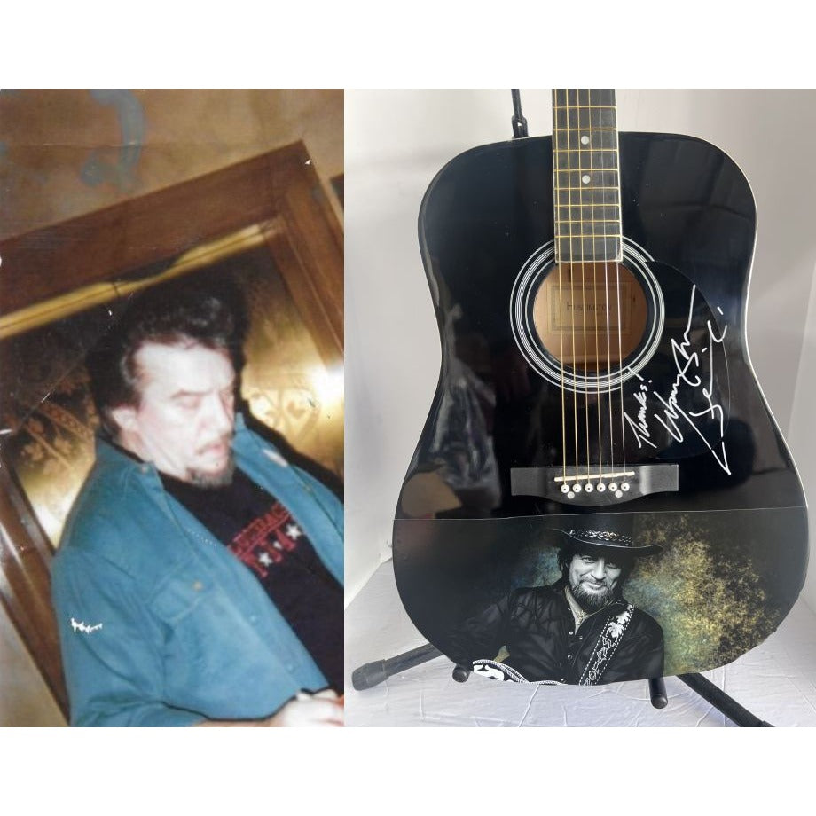 Waylon Jennings black acoustic guitar signed with proof