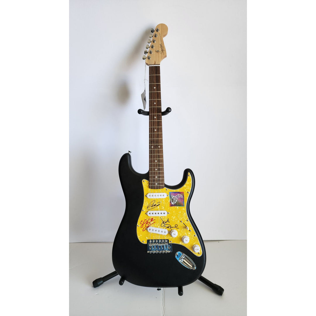 Eric Clapton, Ginger Baker, Jack Bruce, Cream, authentic Fender Stratocaster electric guitar signed with proof